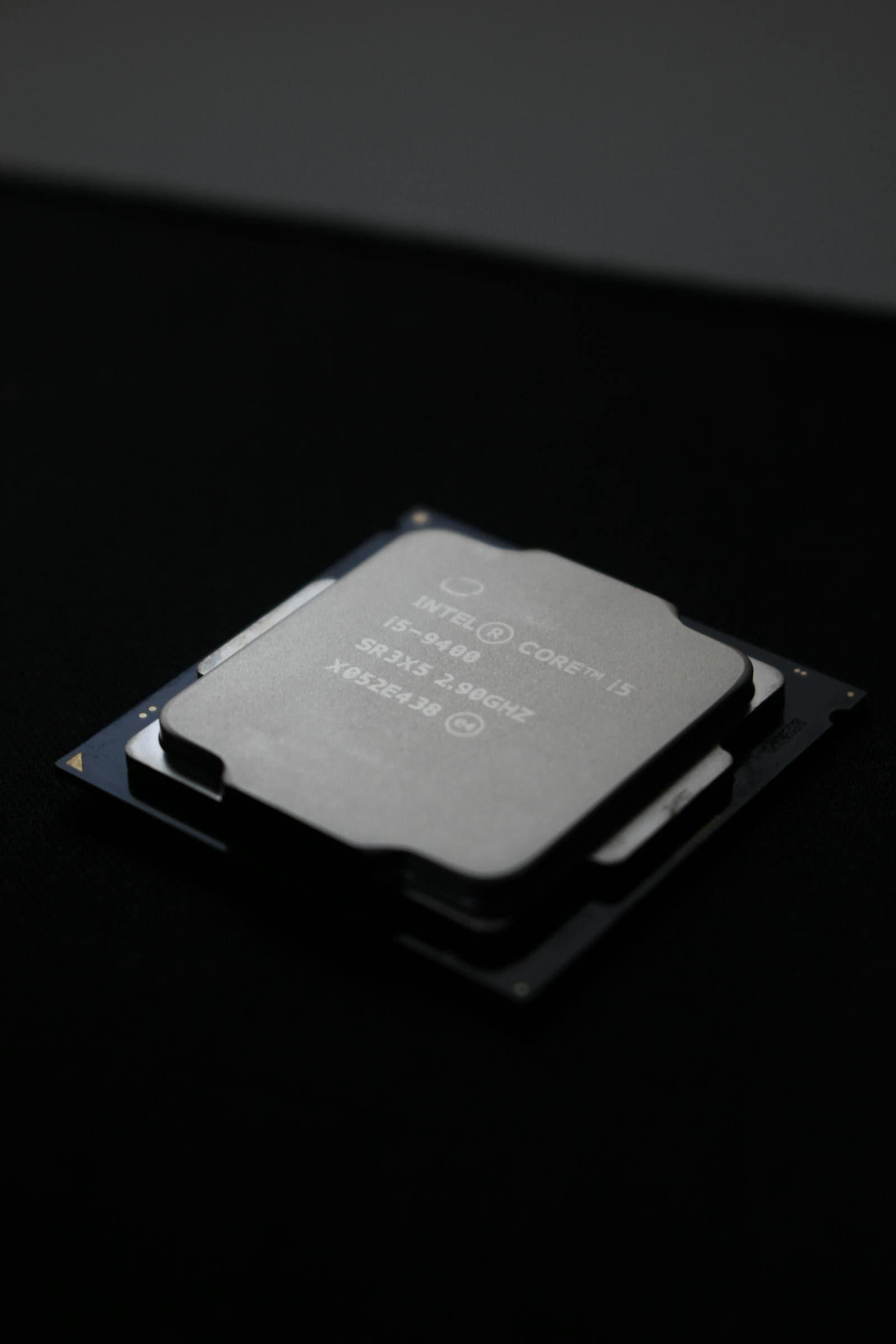 A CPU chip — the processor installs into the motherboard socket before anything goes in the case