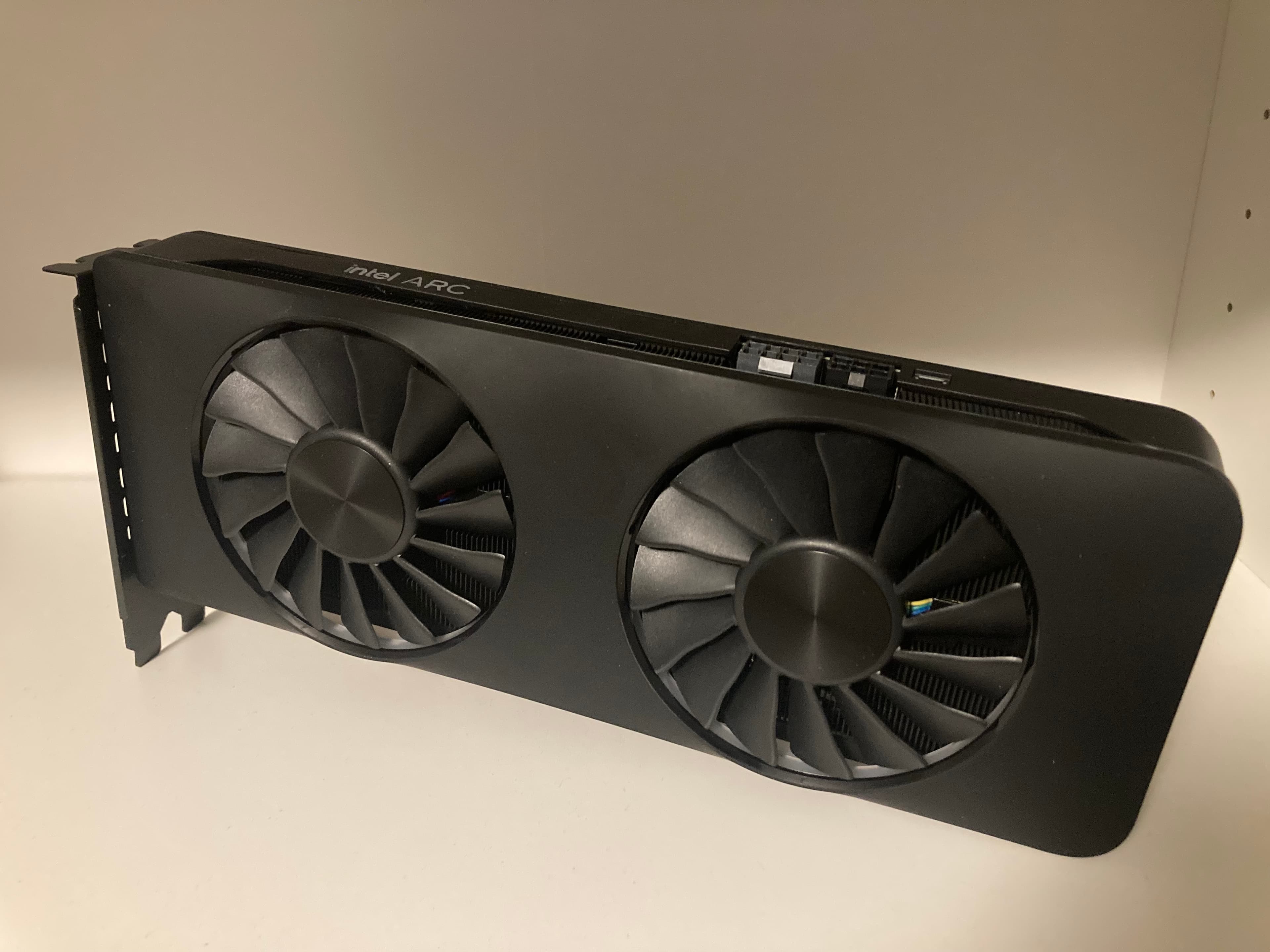 Intel Arc GPU with the "intel ARC" branding visible on the dual-fan shroud — the Arc A-series design shared across the lineup, from the A380 to the A770