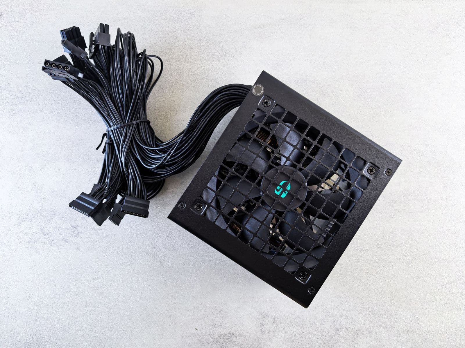 PSU modular cables laid out. Fully modular means you only connect the cables you actually need, which keeps the case interior tidy and maintains airflow