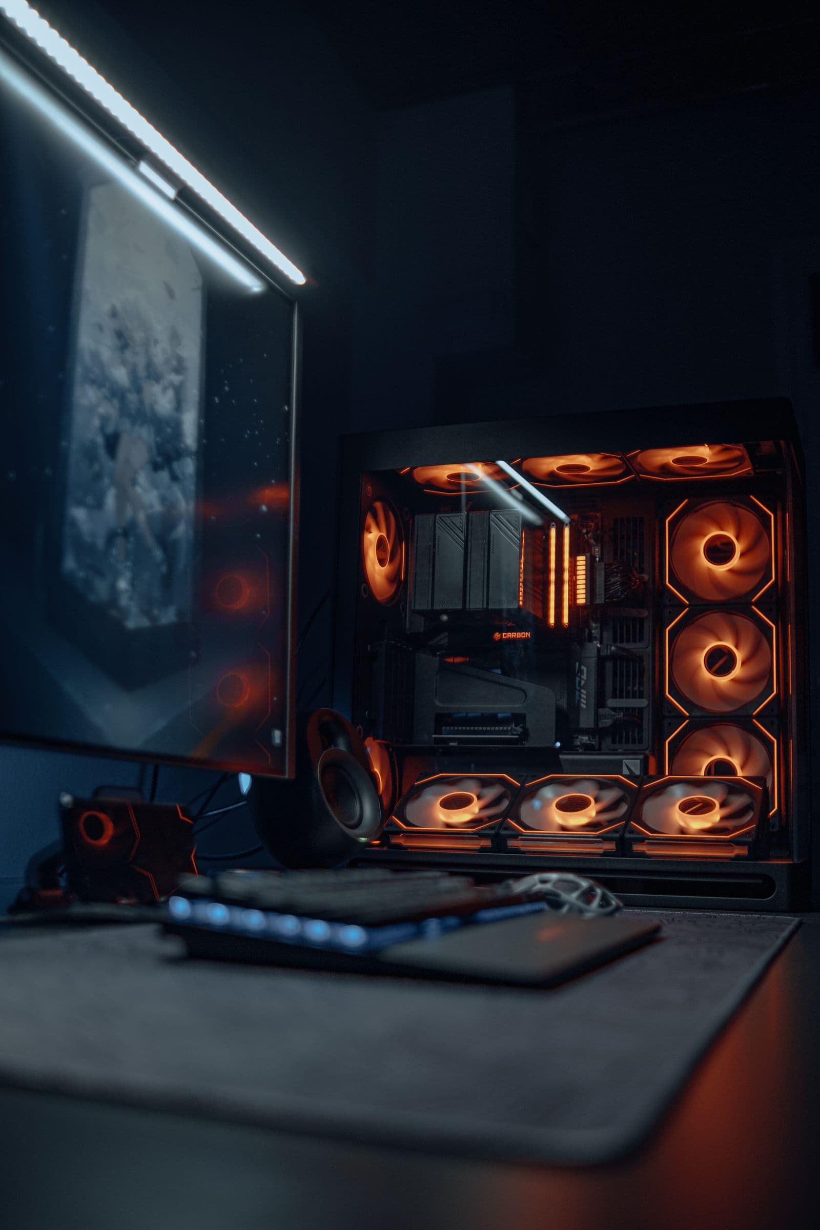 RGB gaming desk setup with a PC and monitor, the kind of setup a 1440p GTA 6 target is built around