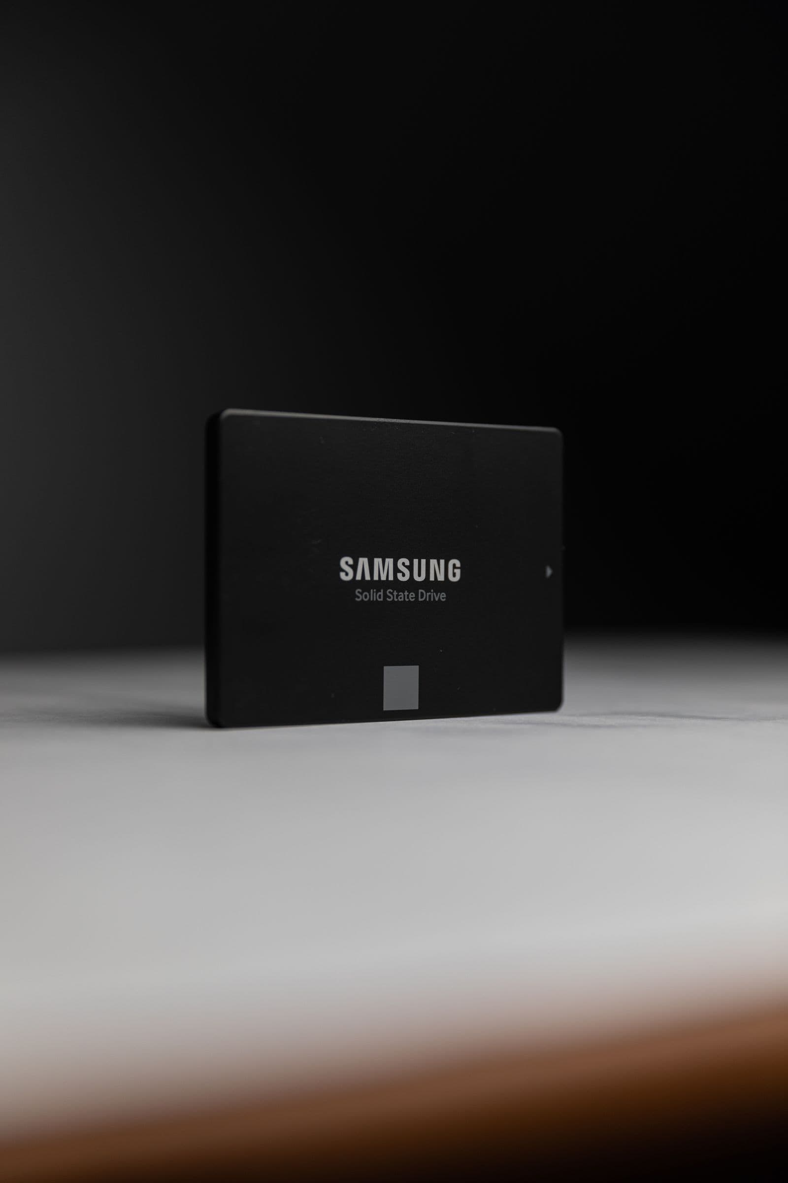 Close-up of a 2.5 inch Samsung SATA solid state drive on a dark surface